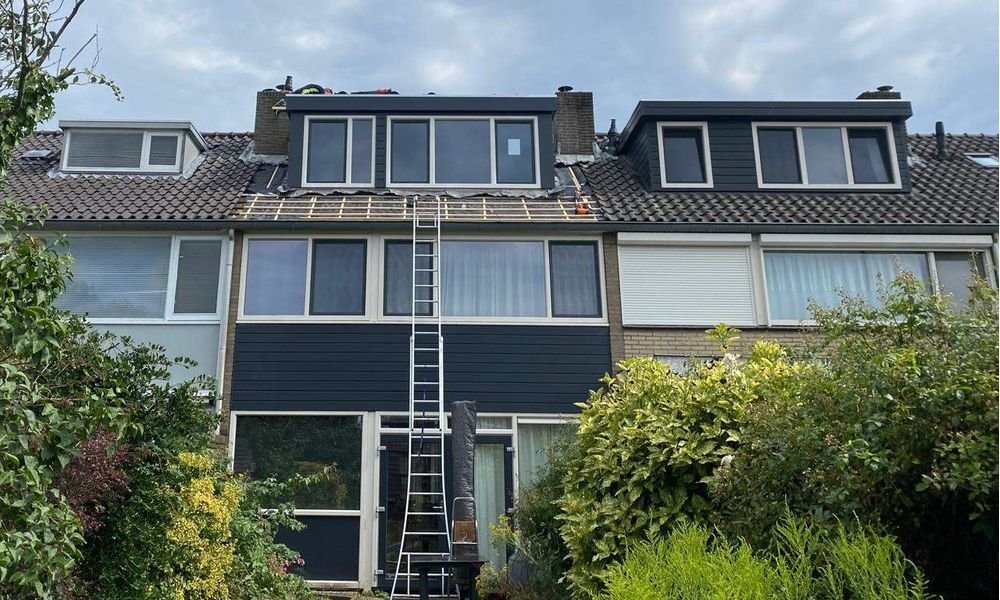 Wat kost een plat dak herstellen in Stein?